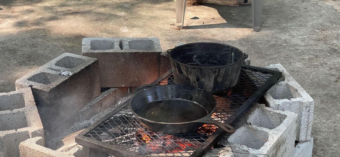 How to Season Your Cast Iron Over the Fire